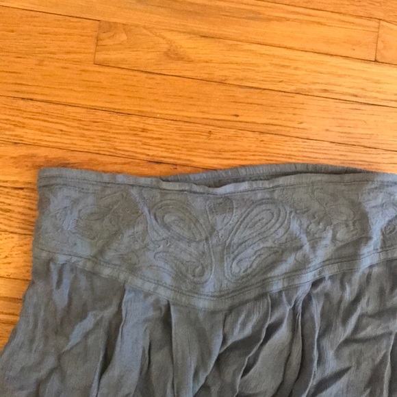 Floor length blue skirt